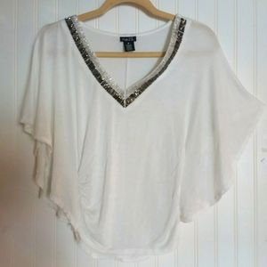 RUE 21 white top in medium.   Cute detailing.